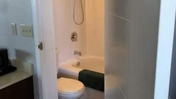 Separate tub and shower, towels