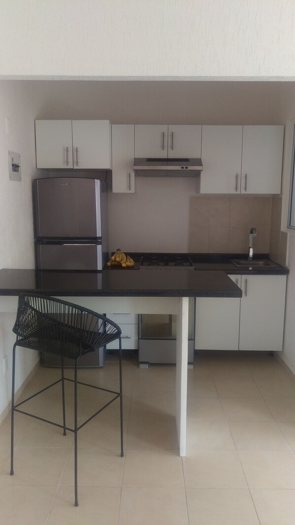 Fridge, microwave, oven, stovetop