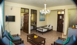 Standard Apartment, 2 Bedrooms | Living area | TV