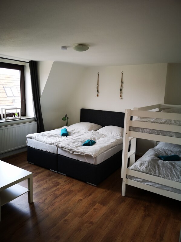 City Apartment, City View | Desk, blackout drapes, cribs/infant beds, bed sheets