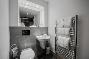 Standard Double Room, 1 King Bed, Partial Sea View | Bathroom | Shower, rainfall showerhead, free toiletries, hair dryer