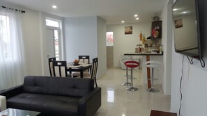Family Apartment, 2 Bedrooms, Balcony (Sea Breeze 1) | Living area | Flat-screen TV - Caribbean Sea Breeze (San Andrés)