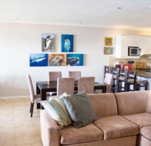 Apartment, 3 Bedrooms | Living area | 32-inch flat-screen TV with satellite channels, TV - Sunset View at Whale Cove (De Kelders)