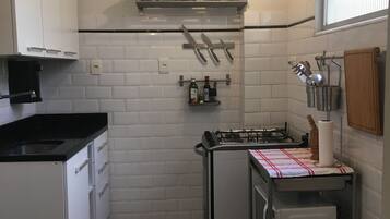 Apartment | Private kitchen | Full-sized fridge, microwave, oven, stovetop