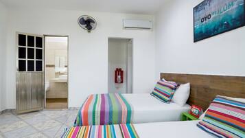 Standard Triple Room | Desk, iron/ironing board, free WiFi, bed sheets