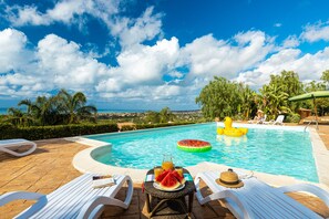 Seasonal outdoor pool, pool umbrellas, sun loungers