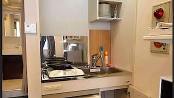 Fridge, microwave, cookware/dishes/utensils