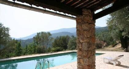A haven of peace in a wild setting with an olive grove garden pool