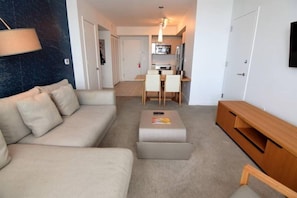 Condo (BW-1104) | Living room | Flat-screen TV - Great Bay View 2 Bed 2 Bath Residence @ Beachwalk (Hallandale Beach)