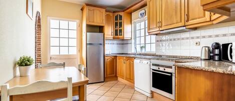 Fridge, oven, coffee/tea maker, toaster