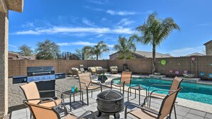 A backyard with a barbecue grill, outdoor seating, a hot tub, and a swimming pool. - Relaxing San Tan Valley Retreat w/ Pool & Hot Tub! (San Tan Valley)