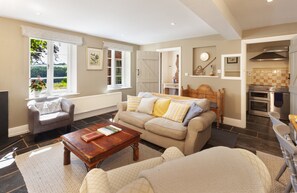TV, fireplace - East Harwood Farm Cottage, Timberscombe (Minehead)