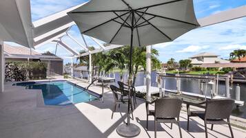House, Multiple Beds (Luxuriously furnished waterfront home) | Pool | A heated pool