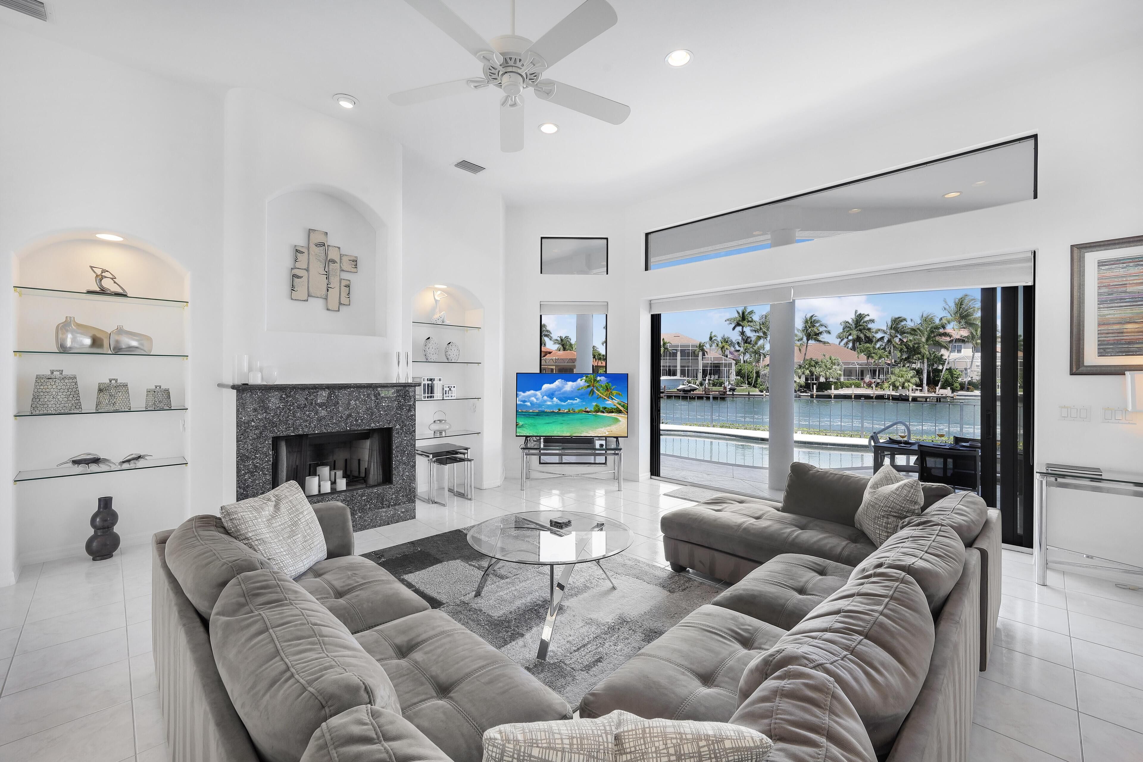 House, Multiple Beds (Waterfront home on key lot with pool,) | Living area | Flat-screen TV