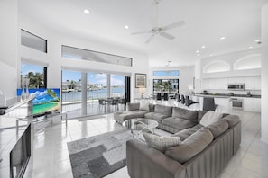 House, Multiple Beds (Waterfront home on key lot with pool,) | Living area | Flat-screen TV