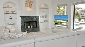 House, Multiple Beds (Waterfront home on key lot with pool,) | Living area | Flat-screen TV