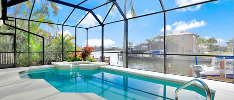 House, Multiple Beds (Elegantly decorated waterfront home w) | Pool | A heated pool