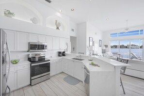 House, Multiple Beds (Waterfront home with views, pool and ) | Private kitchen