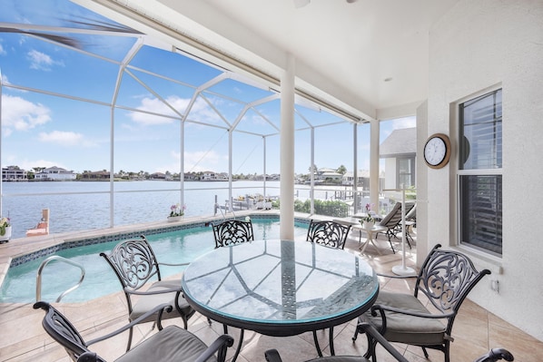 House, Multiple Beds (Waterfront home with views, pool and ) | Outdoor dining
