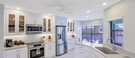 House, Multiple Beds (Pet-friendly waterfront home on key l) | Private kitchen | Fridge, microwave, oven, stovetop