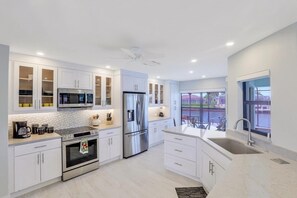 House, Multiple Beds (Pet-friendly waterfront home on key l) | Private kitchen