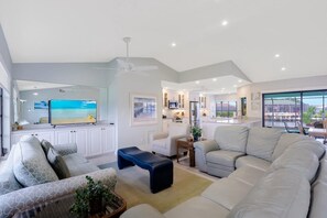 House, Multiple Beds (Pet-friendly waterfront home on key l) | Living area | Flat-screen TV - Pet-friendly Waterfront Home on key lot With View (Marco Island)
