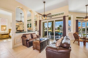 House, Multiple Beds (Waterfront home with pool, spa and wa) | Living area | Flat-screen TV - Waterfront Home With Pool, spa and Walk to Beach (Marco Island)