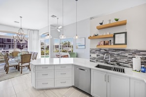 House, Multiple Beds (Stylish waterfront home with pool and) | Private kitchen | Fridge, microwave, stovetop, dishwasher - Stylish Waterfront Home With Pool and Private Dock (Marco Island)