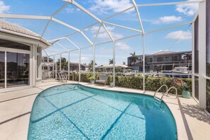 House, Multiple Beds (Stylish waterfront home with pool and) | Pool | A heated pool