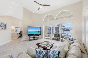 House, Multiple Beds (Waterfront home with spectacular view) | Living area | Flat-screen TV