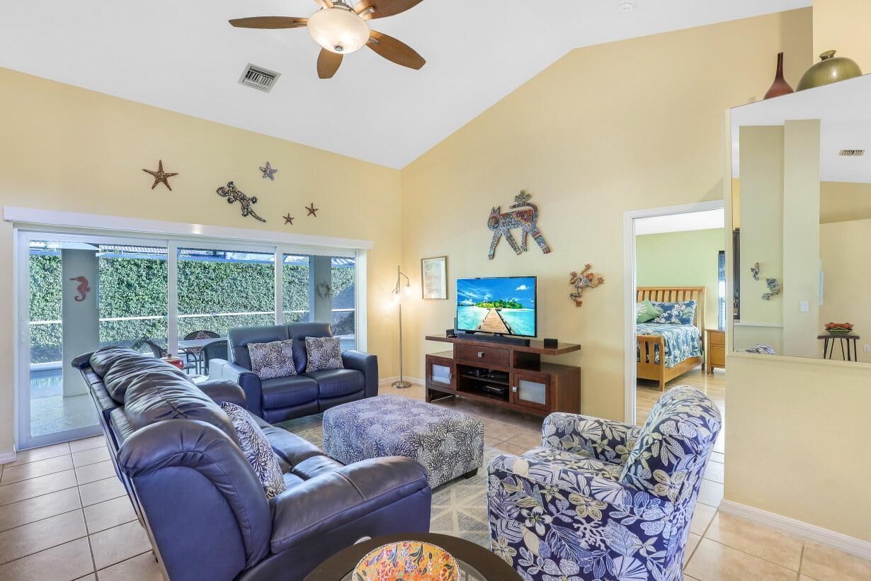 House, Multiple Beds (Pet-friendly home with pool and steps) | Living area | Flat-screen TV