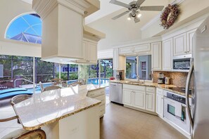 House, Multiple Beds (910 Olive Court) | Private kitchen | Fridge, microwave, oven, stovetop - 910 Olive Court (Marco Island)