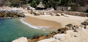 On the beach, sun loungers, beach towels