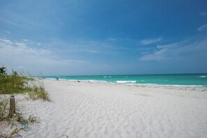 On the beach, sun-loungers, beach towels