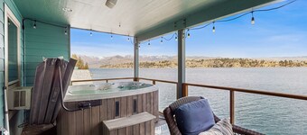 Lakefront home with private hot tub, dock, kayaks, covered veranda & huge views