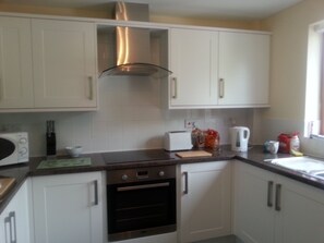 Fridge, microwave, oven, stovetop - Spacious  holiday cottage in Bowness on Windermere, Lake Distrct, Uk (Windermere)