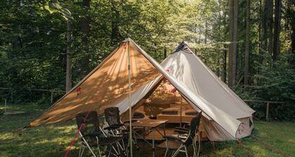 Rent a family BELL family fully equipped tent with real beds in nature.