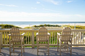 Guests can enjoy the ocean views from the deck, surrounded by Adirondack chairs.