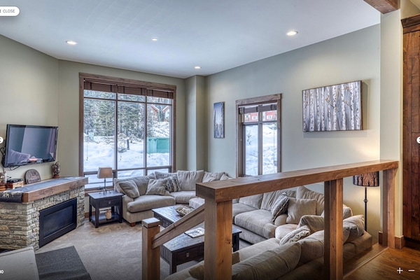 Family room - lots of seating, fireplace and TV