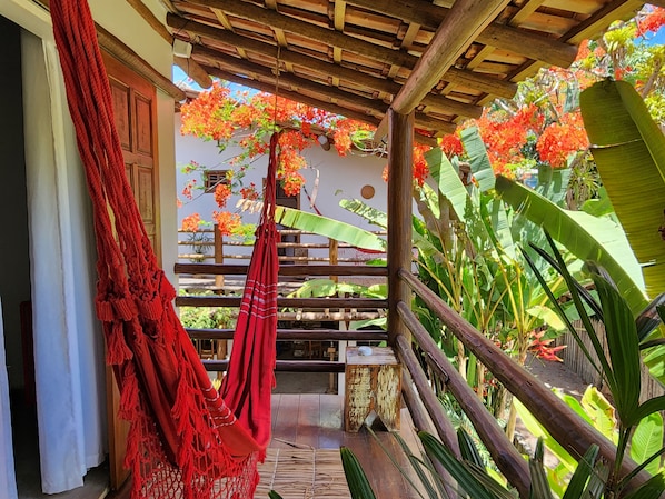 Habitación doble de uso individual, 1 habitación | Zona de estar | Televisión LCD de 40 pulgadas con canales por cable, una televisión