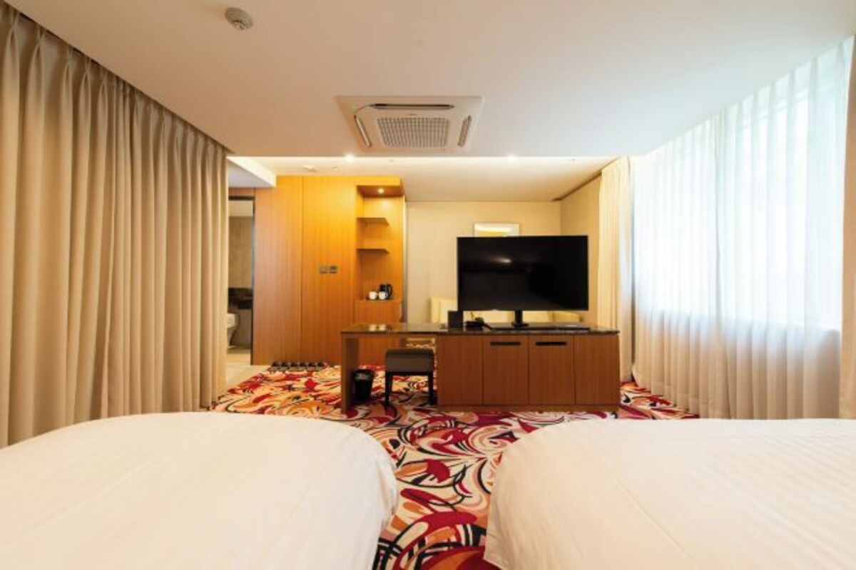 Premium bedding, down duvets, in-room safe, desk