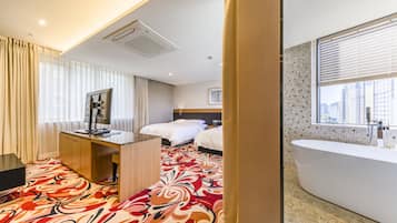 Premium bedding, down duvets, in-room safe, desk