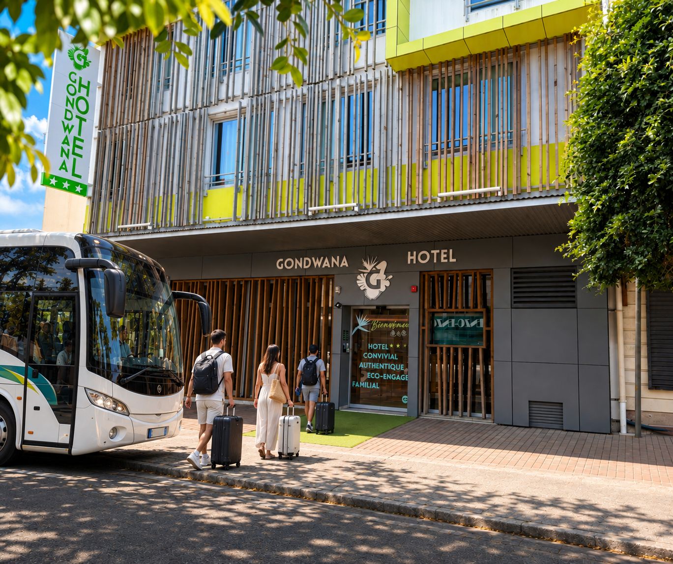 A hotel entrance with a modern facade, a bus parked in front, and people with luggage.