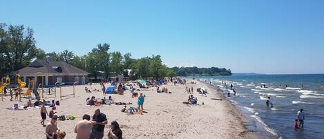 On the beach, sun-loungers, beach towels