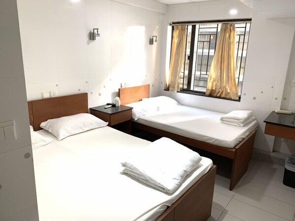 Basic Quadruple Room, Multiple Beds | Free WiFi, bed sheets, wheelchair access