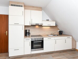 Fridge, oven, dishwasher, high chair