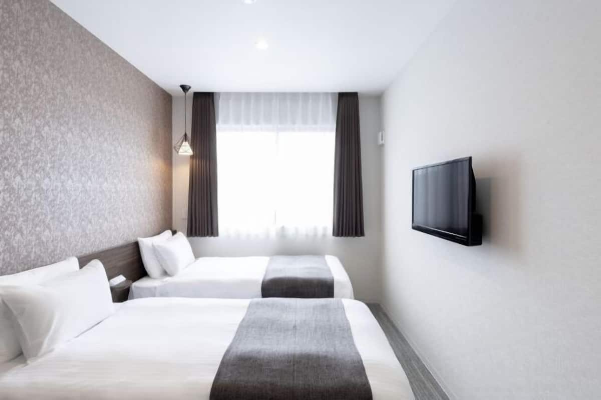 Down comforters, iron/ironing board, free WiFi, bed sheets