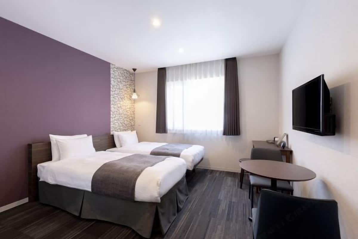 Down comforters, iron/ironing board, free WiFi, bed sheets
