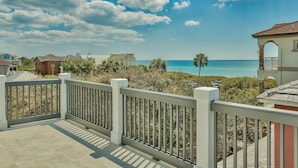 A balcony with a view of the ocean and neighboring houses. - Seagrove, Amazing Gulf Views, Great Beach Access, Heated Pool, Pup Friendly
 (Santa Rosa Beach)