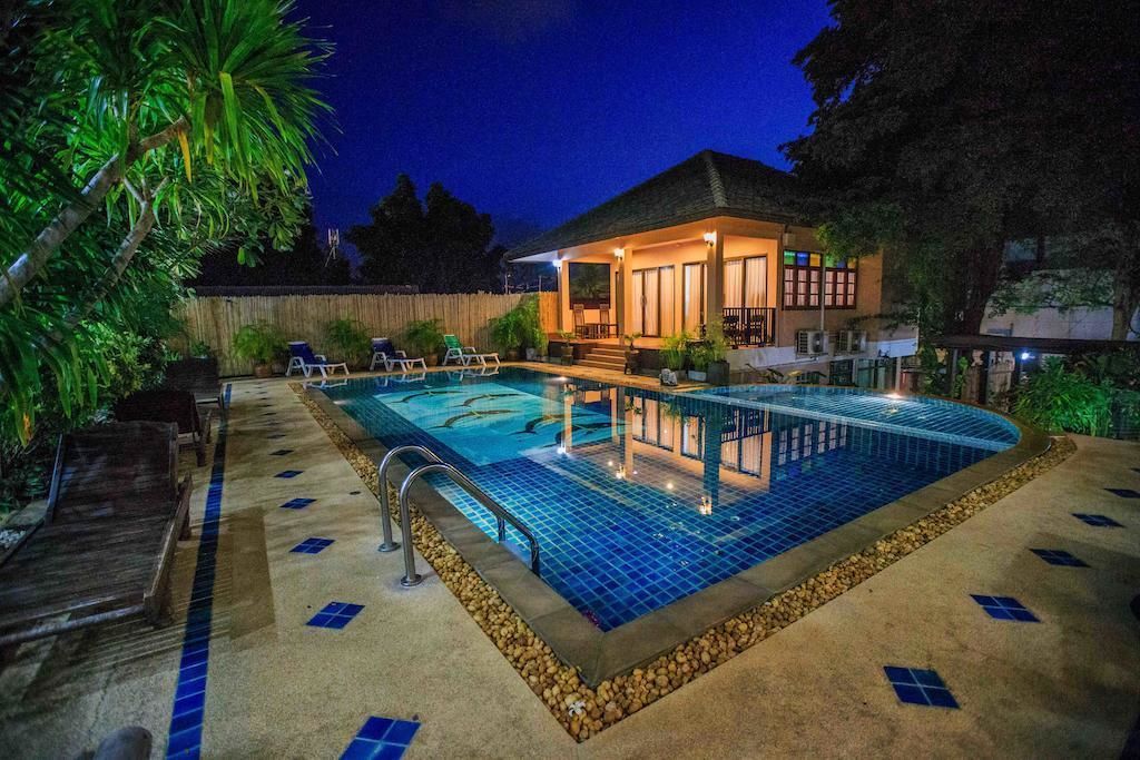 outdoor pool, pool umbrellas, pool loungers